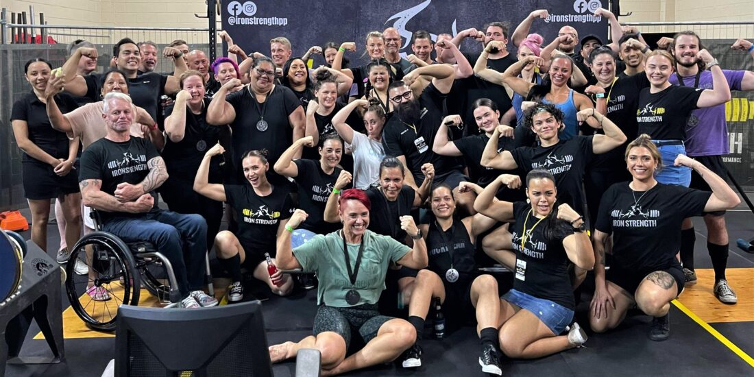 A group shot showing the awesome community of members at Iron Strength Cairns Gym