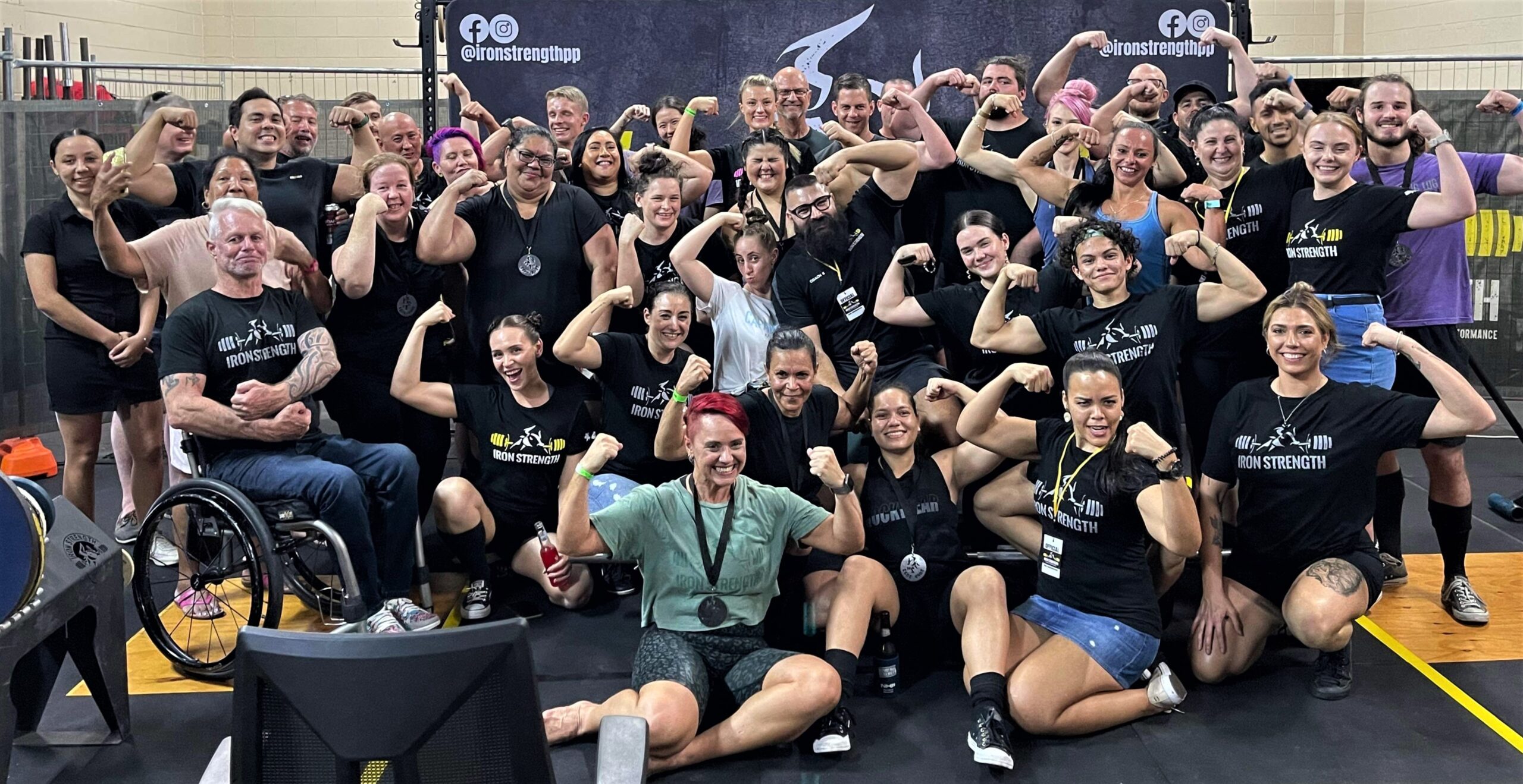 A group shot showing the awesome community of members at Iron Strength Cairns Gym